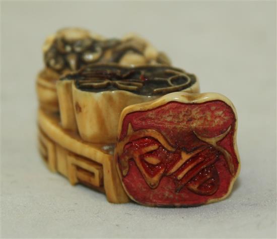 A Japanese ivory multi seal netsuke, 19th century, 5cm